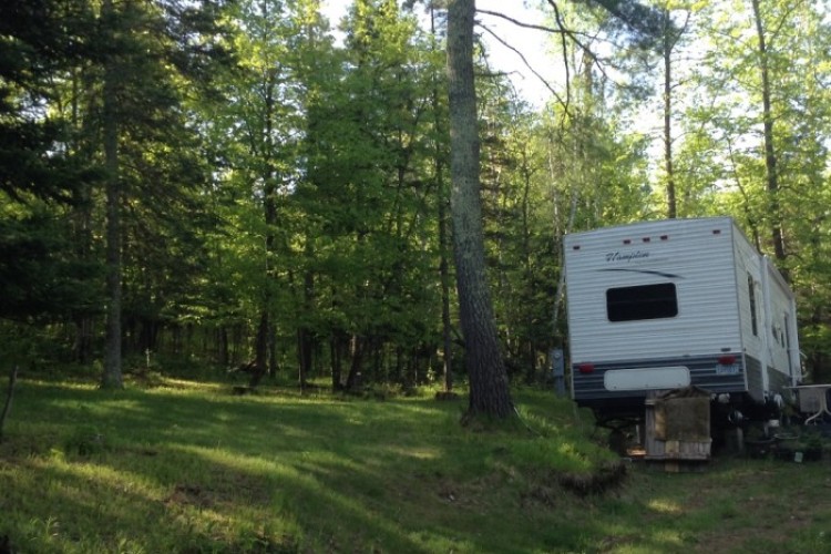 Trailer backs up to Natl. Forest Trailer backs up to Natl. Forest