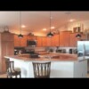 Multi level counter tops with island sink and stainless appliance package