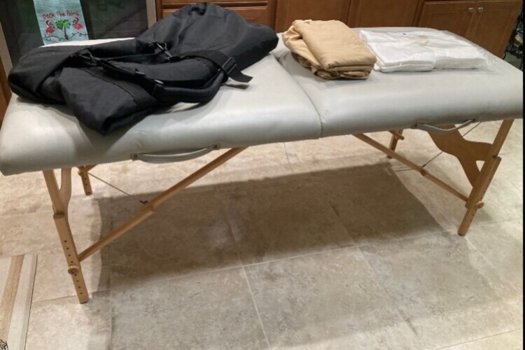 Massage table with accessories